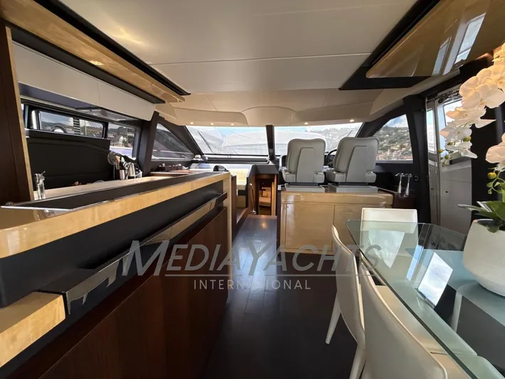  Yacht Photos Pics Luxurious interior of 2019 Azimut Fly 72 yacht with modern furnishings and panoramic windows.