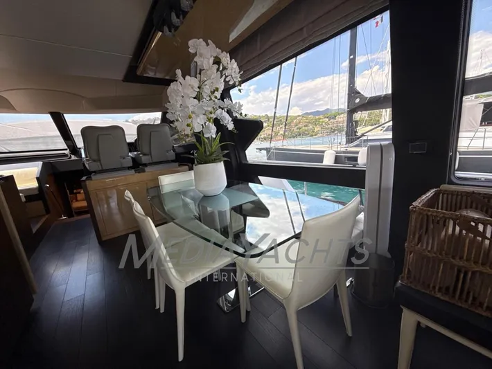  Yacht Photos Pics Luxurious interior of 2019 Azimut Fly 72 yacht with elegant dining area and scenic views.