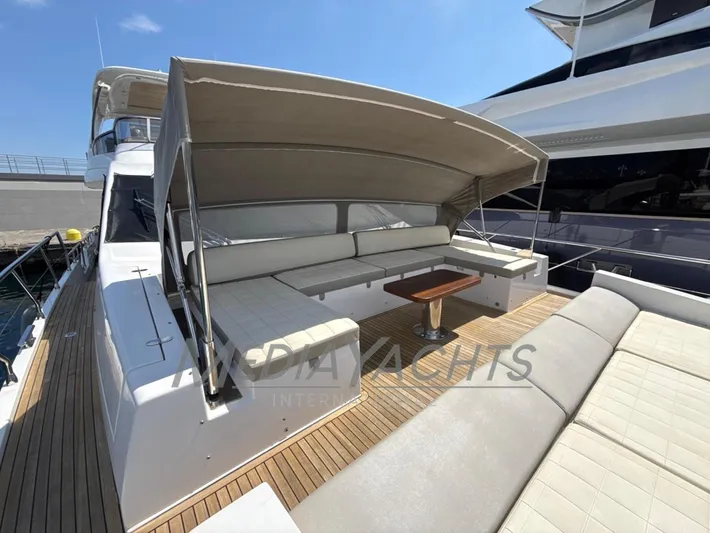 Yacht Photos Pics 2019 Azimut Fly 72 yacht with shaded deck seating and wooden flooring.