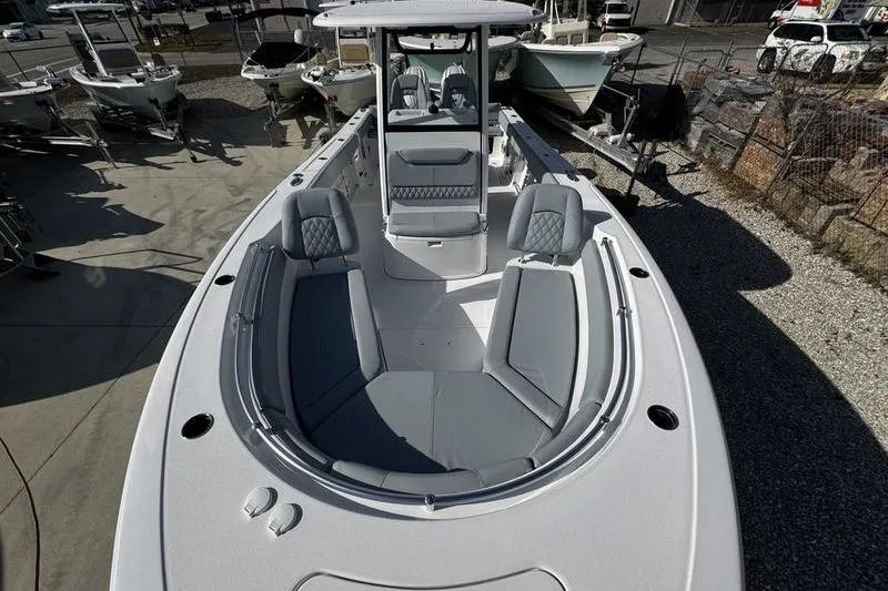  Yacht Photos Pics 2026 Sportsman Heritage 261 Center Console boat with spacious seating and modern design.
