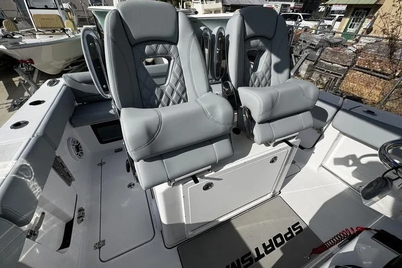  Yacht Photos Pics 2026 Sportsman Heritage 261 Center Console with luxurious seating and modern design.