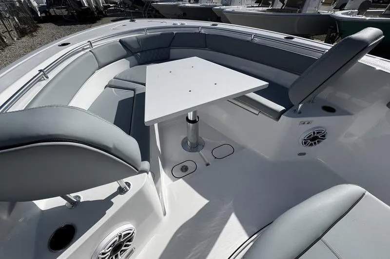  Yacht Photos Pics 2026 Sportsman Heritage 261 Center Console boat interior with seating and table.