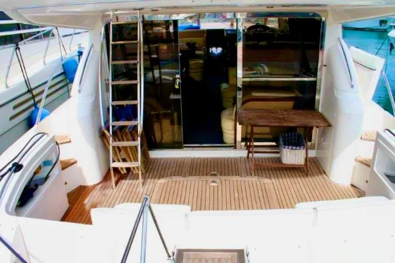  Yacht Photos Pics Luxury yacht Princess 56, 2000 model, featuring spacious deck and elegant interior.