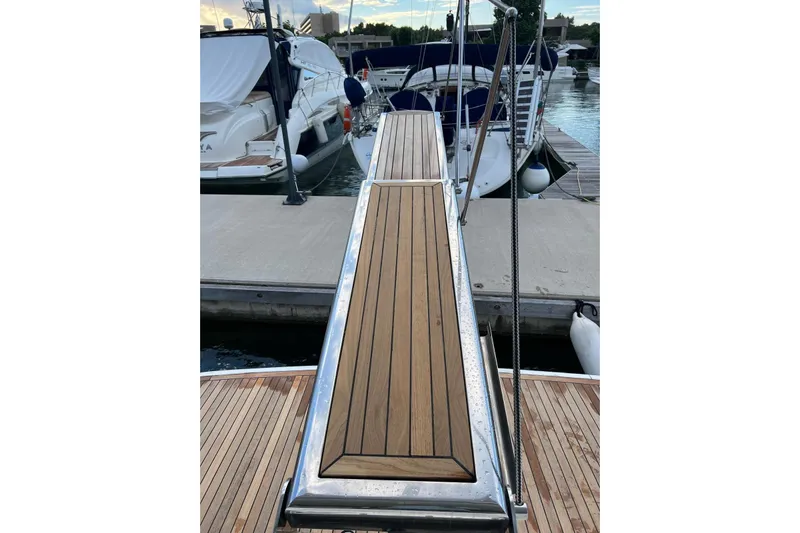  Yacht Photos Pics Teak deck of a 2000 Princess 56 yacht at marina dock.