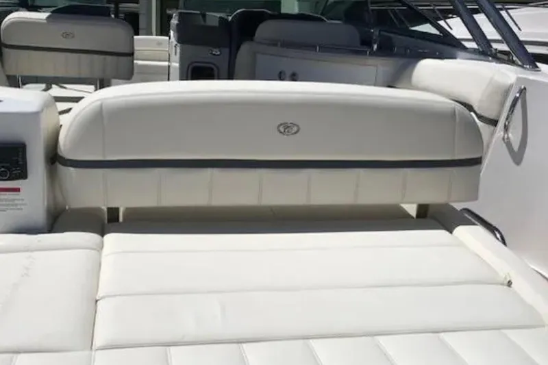  Yacht Photos Pics Luxurious white seating on a 2018 Cobalt R35 boat, showcasing comfort and style.