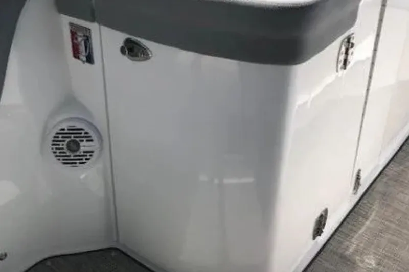  Yacht Photos Pics 2018 Cobalt R35 boat interior with speaker and storage compartments.