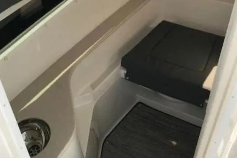  Yacht Photos Pics 2018 Cobalt R35 boat interior cabin with seating and storage.