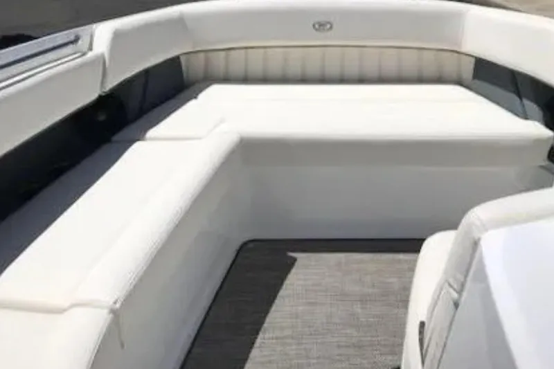 Yacht Photos Pics 2018 Cobalt R35 boat interior with white cushioned seating.