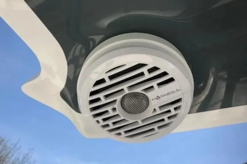  Yacht Photos Pics Outdoor speaker on a 2018 Cobalt R35 boat against a clear blue sky.
