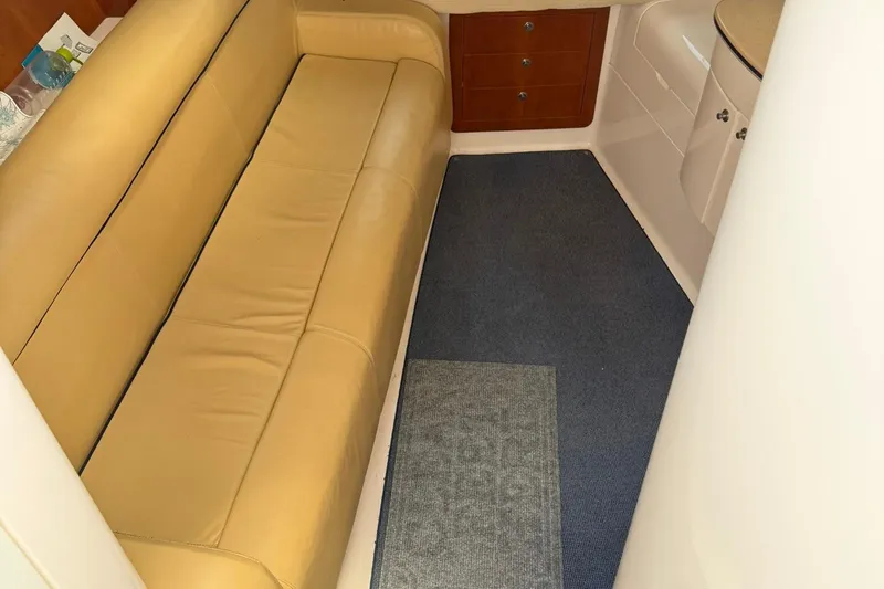  Yacht Photos Pics Interior of a 2006 Intrepid 377 boat with beige leather seating.