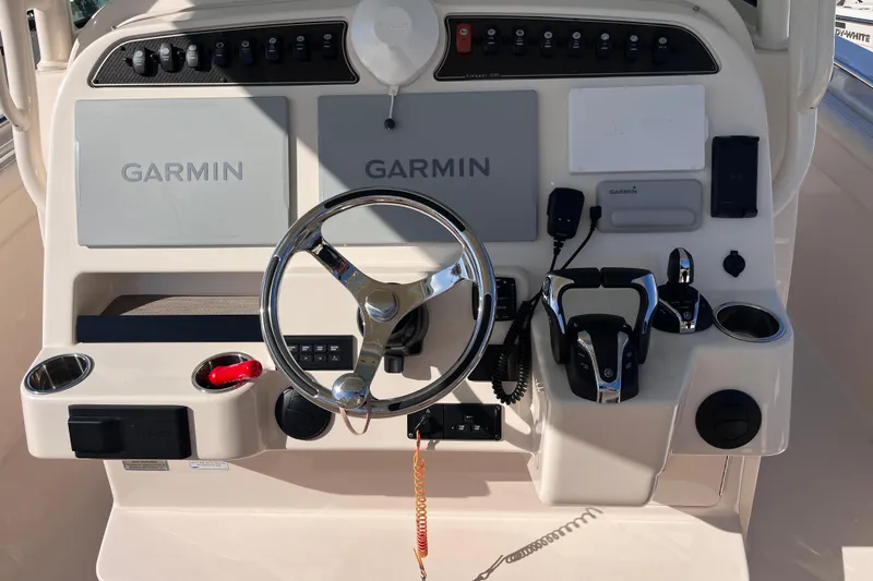 Yacht Photos Pics Control panel of 2022 Grady-White Canyon 336 boat with Garmin navigation systems.