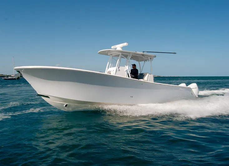  Yacht Photos Pics 2023 Front Runner 33 Center Console boat cruising on open water.
