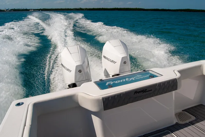  Yacht Photos Pics 2023 Front Runner 33 Center Console boat with dual Mercury engines on open water.