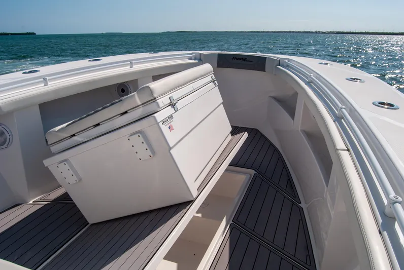  Yacht Photos Pics 2023 Front Runner 33 Center Console boat interior with seating, on open water.