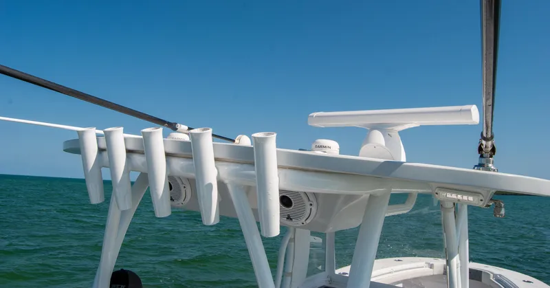  Yacht Photos Pics 2023 Front Runner 33 Center Console boat with rod holders on a sunny day.