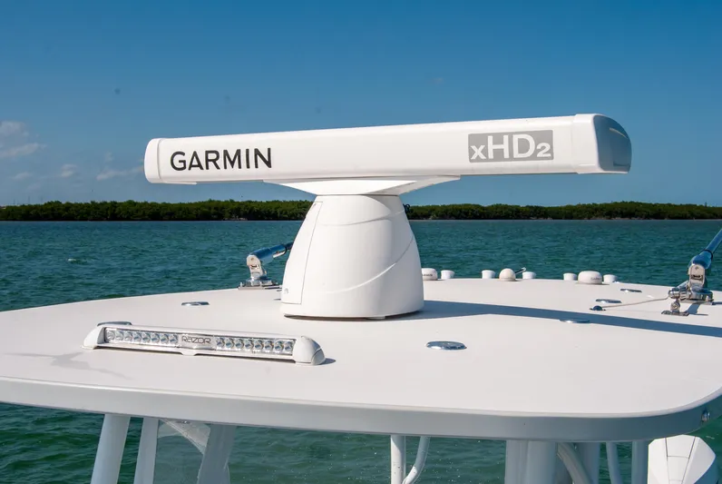  Yacht Photos Pics 2023 Front Runner 33 Center Console with Garmin xHD2 radar on open water.