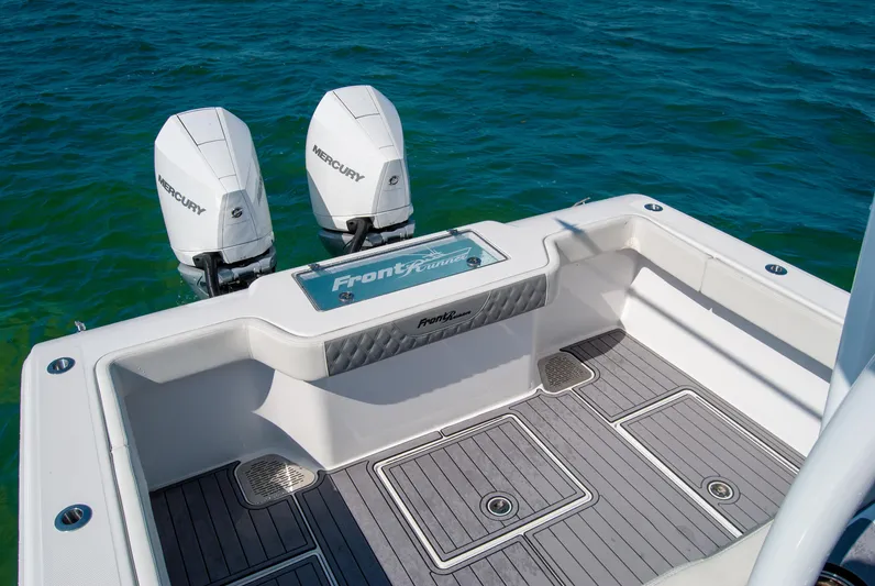  Yacht Photos Pics 2023 Front Runner 33 Center Console boat with twin Mercury engines on blue water.