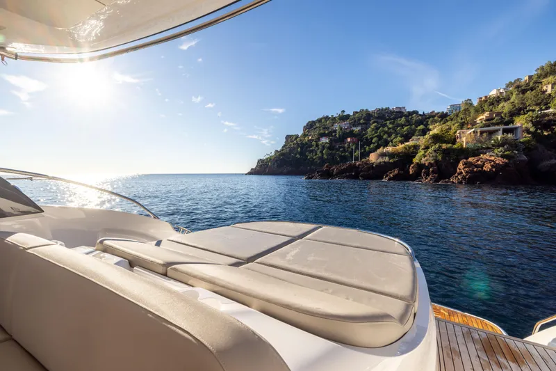 V50 Open Yacht Photos Pics Luxurious 2026 Princess V50 Open yacht with scenic coastal view and sunny skies.