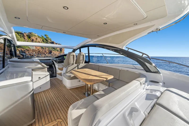 V50 Open Yacht Photos Pics Luxurious 2026 Princess V50 Open yacht interior with elegant seating and ocean view.