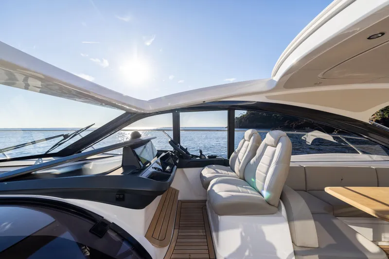 V50 Open Yacht Photos Pics Luxurious 2026 Princess V50 Open yacht interior with plush seating and ocean view.