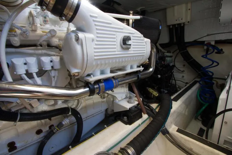 Ohana Yacht Photos Pics Engine room of 2016 Sabre Flybridge boat, showcasing detailed mechanical components.