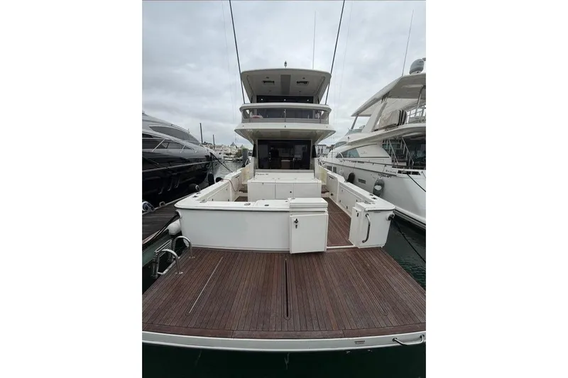  Yacht Photos Pics 2023 Maritimo M600 yacht with spacious deck and modern design at marina.