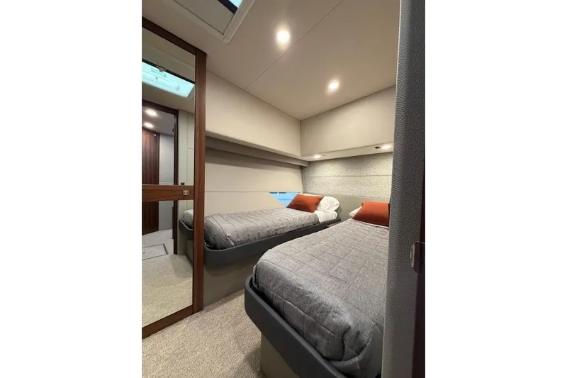  Yacht Photos Pics 2023 Maritimo M600 yacht cabin with twin beds and modern design.