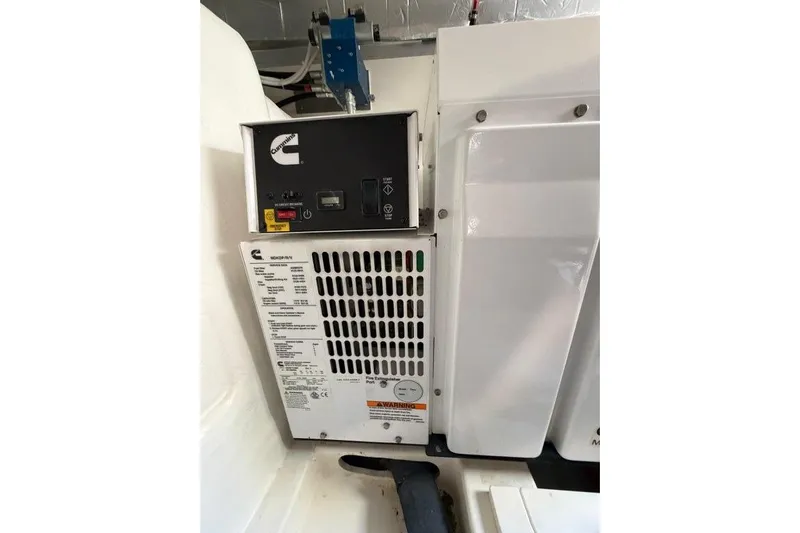  Yacht Photos Pics Engine compartment of 2023 Maritimo M600 yacht featuring Cummins generator.