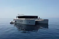Modern Catamaran Ocean Beast 65, 2020 model, cruising on calm blue waters.