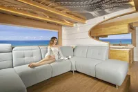 Luxurious interior of 2020 Catamaran Ocean Beast 65 with ocean view and modern furnishings.