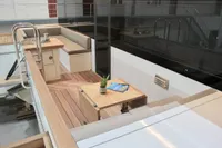 Luxurious Catamaran Ocean Beast 65 deck with seating, table, and modern design, 2020 model.