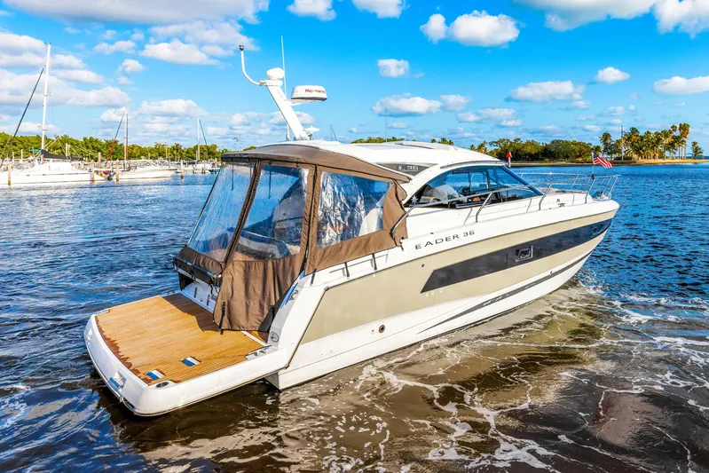  Yacht Photos Pics 2018 Jeanneau Leader 36 yacht cruising on a sunny day with clear skies.