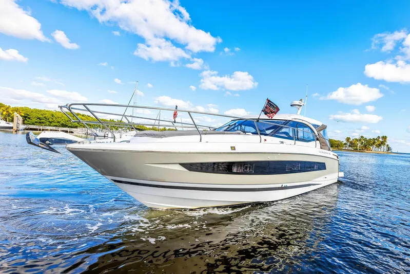  Yacht Photos Pics 2018 Jeanneau Leader 36 yacht cruising on a sunny day with clear blue skies.