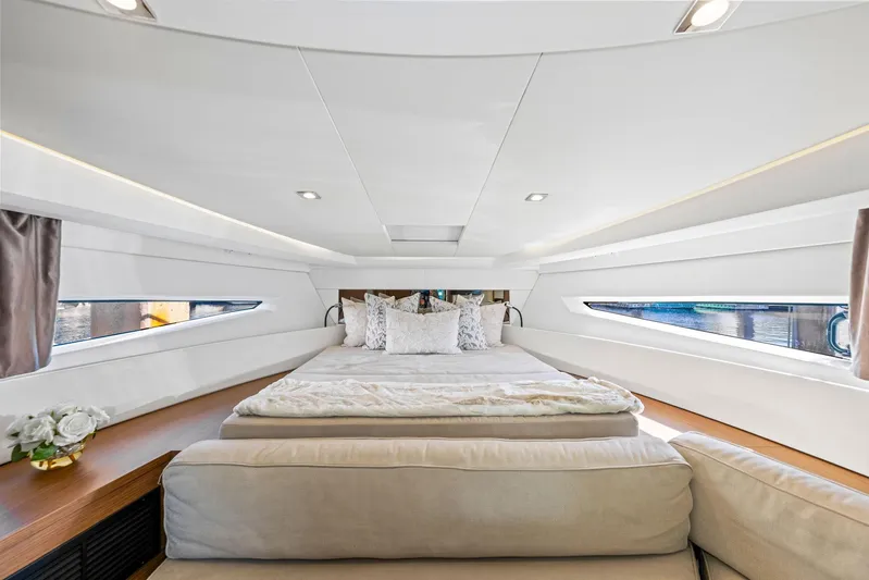  Yacht Photos Pics Luxurious interior of 2018 Jeanneau Leader 36 yacht with elegant bedding and modern design.