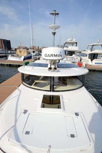 Chestnuts Yacht Photos Pics 2020 Ranger Tugs R-27 boat docked, featuring Garmin radar, in a marina setting.