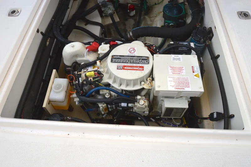 Chestnuts Yacht Photos Pics Engine compartment of a 2020 Ranger Tugs R-27 boat, featuring a Westerbeke generator.