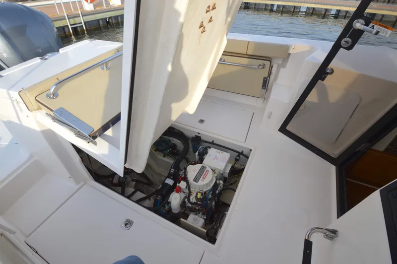 Chestnuts Yacht Photos Pics 2020 Ranger Tugs R-27 boat engine compartment with open access panels.