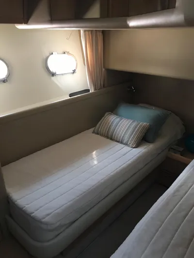  Yacht Photos Pics 2005 Ferretti Yachts 500 cabin with twin beds and porthole windows.