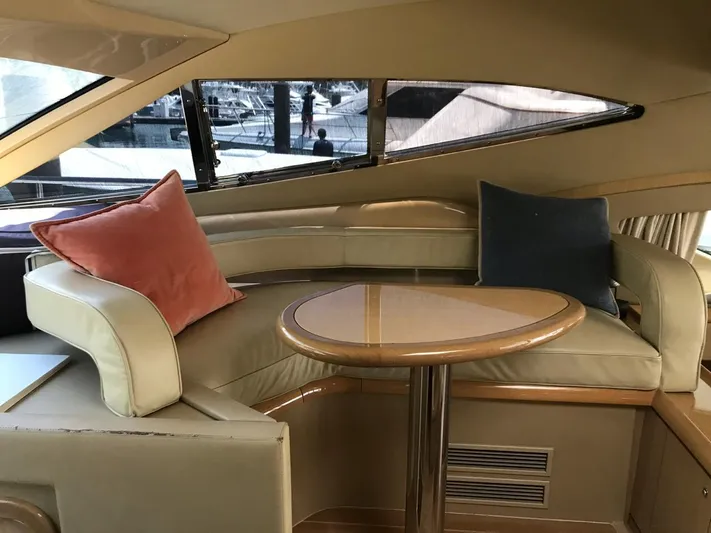  Yacht Photos Pics Luxurious interior of a 2005 Ferretti Yachts 500 with elegant seating and cushions.