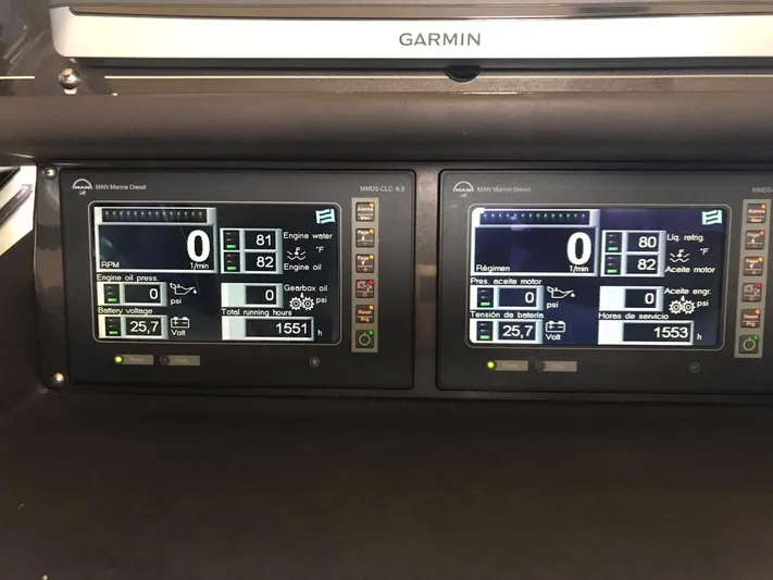  Yacht Photos Pics Digital control panels on a 2005 Ferretti Yachts 500, displaying engine and navigation data.
