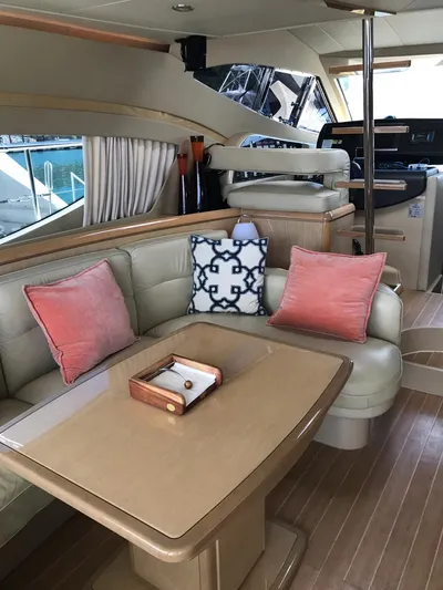  Yacht Photos Pics Luxurious interior of a 2005 Ferretti Yachts 500 with elegant seating and decor.