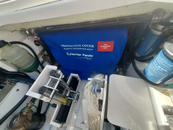 Fiji Kai Yacht Photos Pics Engine compartment of 2023 Pursuit S378 with Fischer Panda protective cover.