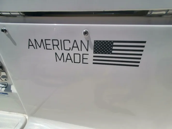 Fiji Kai Yacht Photos Pics American flag and "American Made" text on 2023 Pursuit S378 boat.