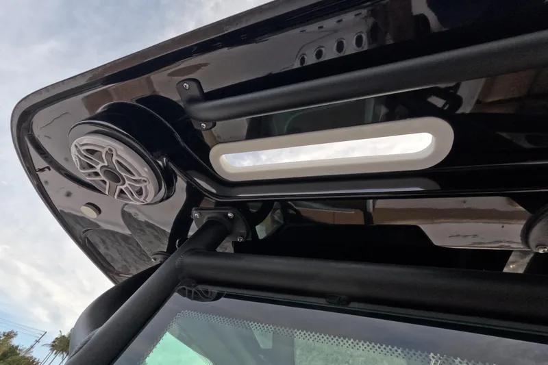  Yacht Photos Pics 2024 Caymas 281 HB boat roof with speaker and light detail.