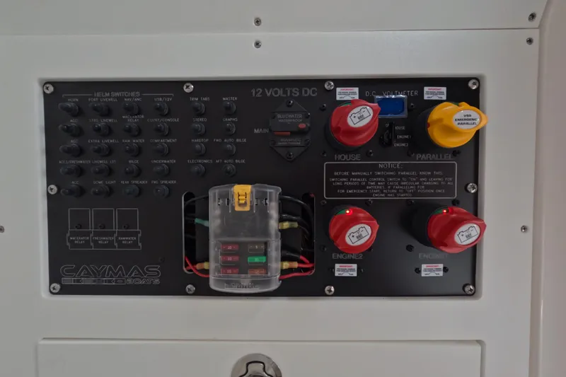  Yacht Photos Pics 2024 Caymas 281 HB boat control panel with switches and battery controls.