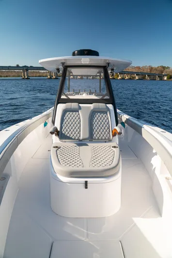  Yacht Photos Pics 2026 Front Runner 36 Center Console boat on water, featuring sleek design and comfortable seating.