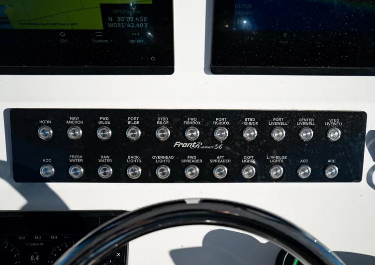  Yacht Photos Pics Control panel of 2026 Front Runner 36 Center Console boat with labeled switches.