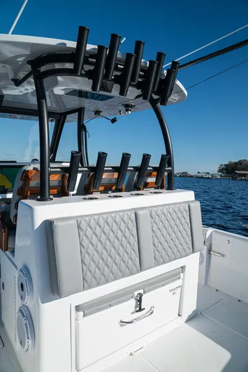  Yacht Photos Pics 2026 Front Runner 36 Center Console boat with rod holders and cushioned seating.