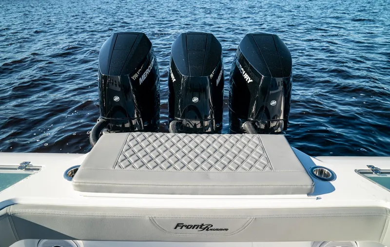  Yacht Photos Pics 2026 Front Runner 36 Center Console with triple Mercury outboard engines on open water.