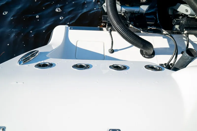  Yacht Photos Pics 2026 Front Runner 36 Center Console boat detail with water droplets and engine components.